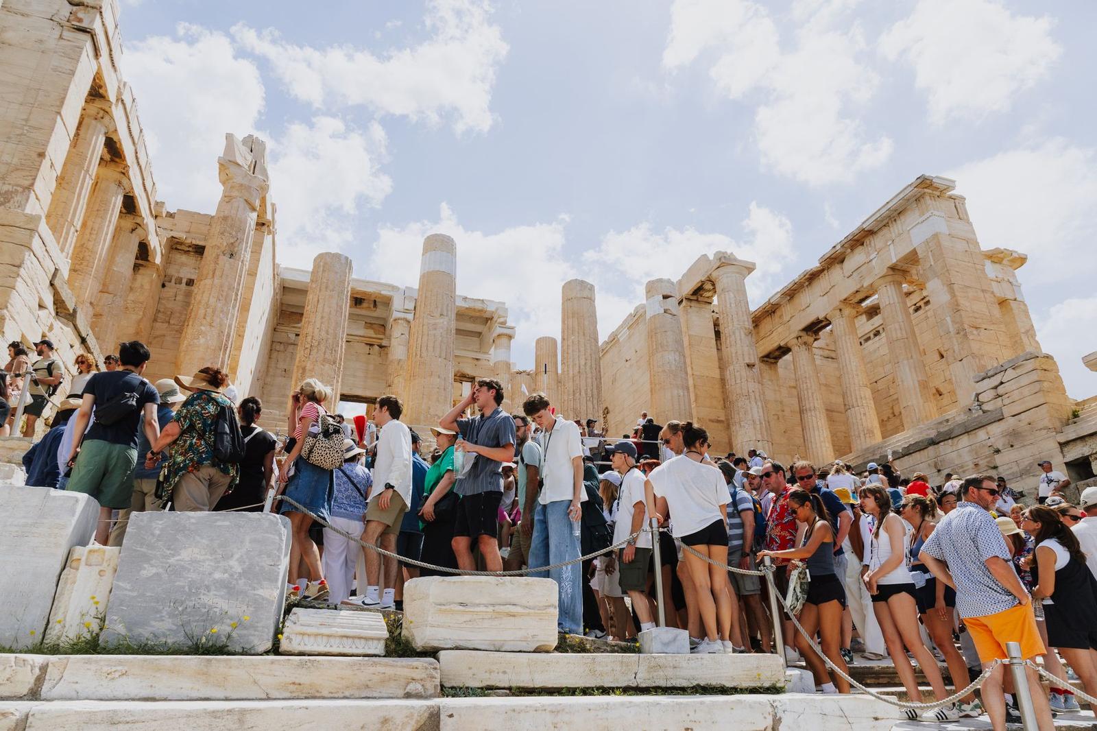 Tourists Exploring the Parthenon in Athens