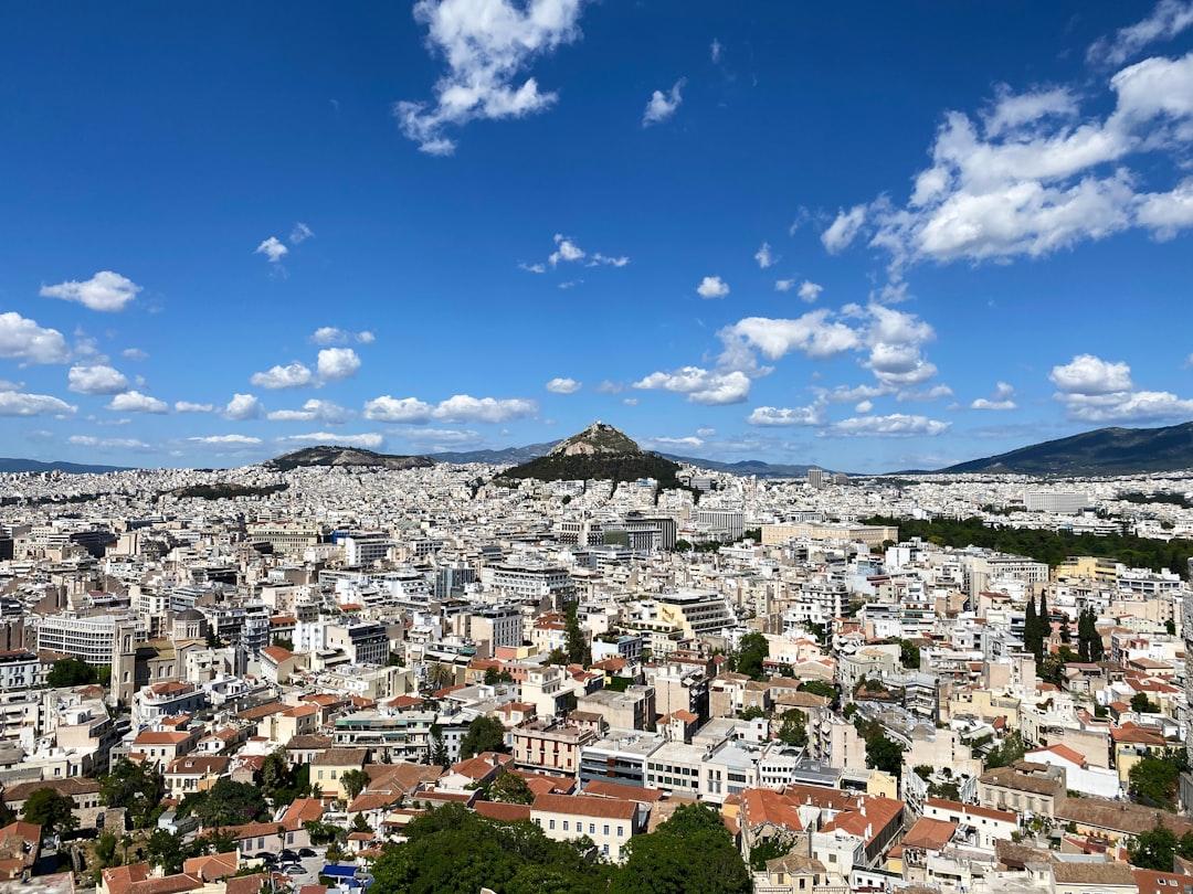 City with High Rise Buildings under Blue Sky during Daytime